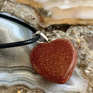 2401 Sparkling Polished Goldstone Heart Necklace on Black Cord